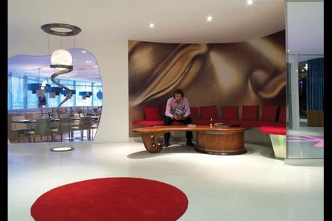 The reception, with its curving lines, demonstrates the design influence of Karim Rashid. 